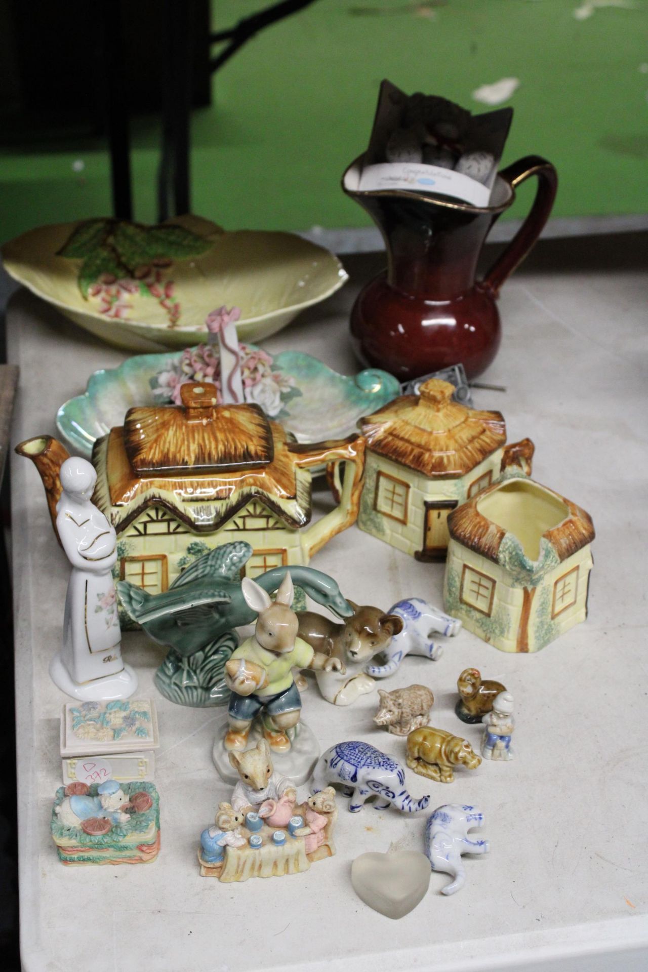 A MIXED LOT OF KEELE ST POTTERY, CARLTON WARE AND WADE FIGURINES ETC