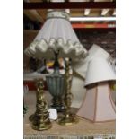 A HEAVY METAL TABLE LAMP WITH CREAM AND FLORAL SHADE, PLUS THREE BRASS TABLE LAMPS AND FOUR SHADES
