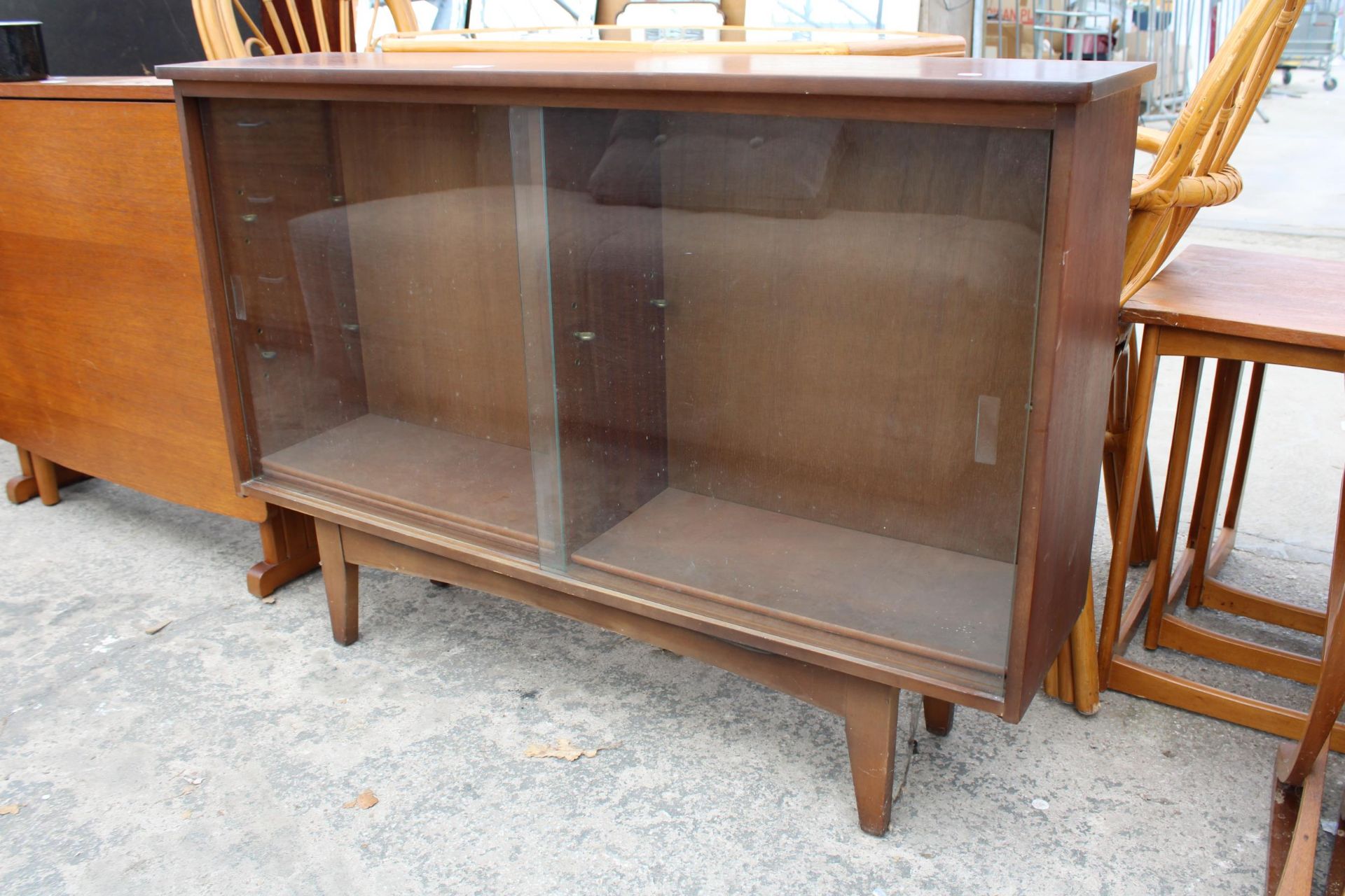 A RETRO TEAK BOOKCASE WITH TWO SLIDING GLASS DOORS 43" WIDE - Image 2 of 2