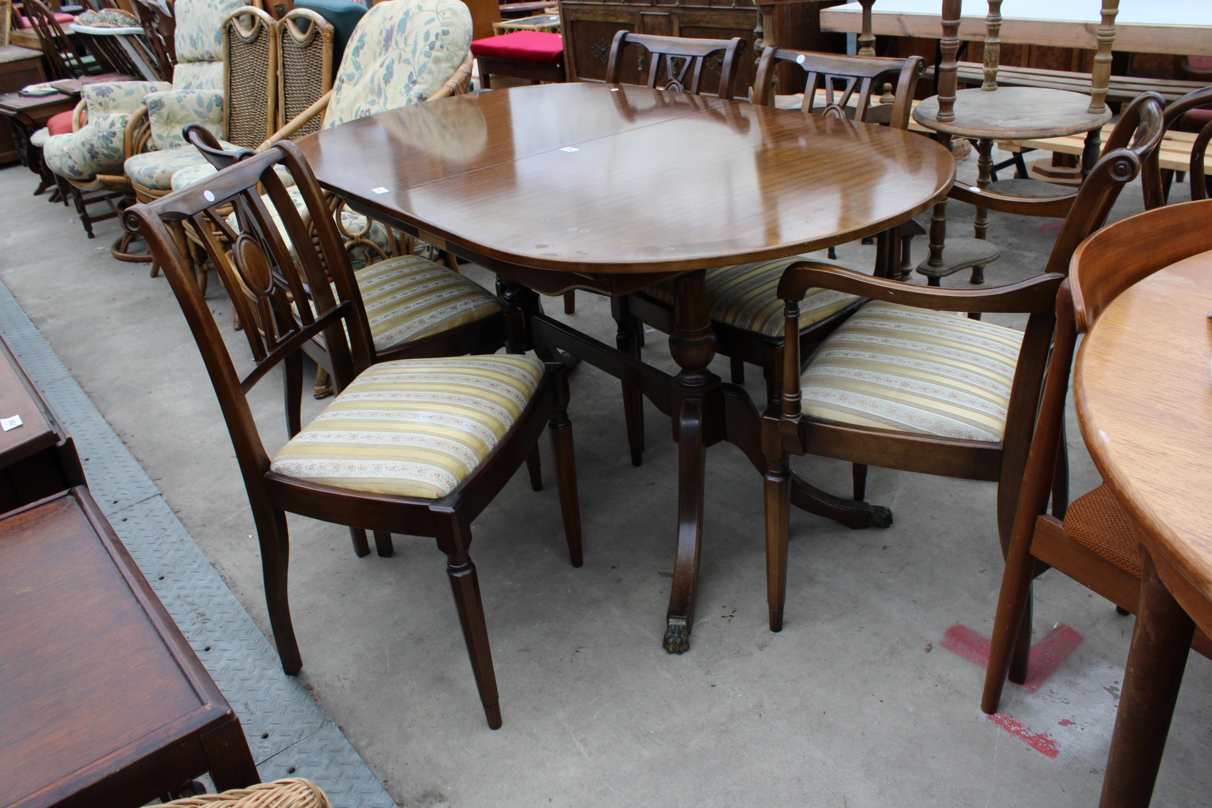 A REGENCY STYLE TWIN PEDESTAL DINING TABLE AND FIVE CHAIRS ONE BEING A CARVER - Image 2 of 3