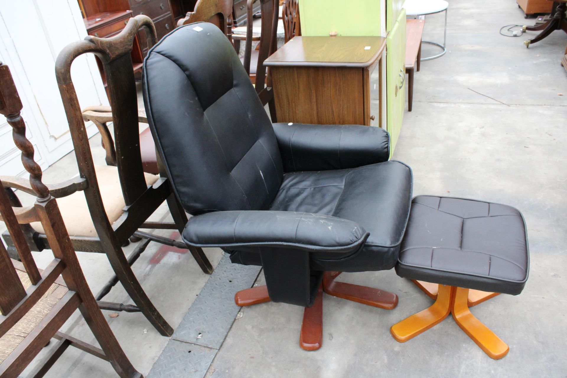 A FAUX BLACK LEATHER SWIVEL RECLINING CHAIR AND STOOL - Image 2 of 2