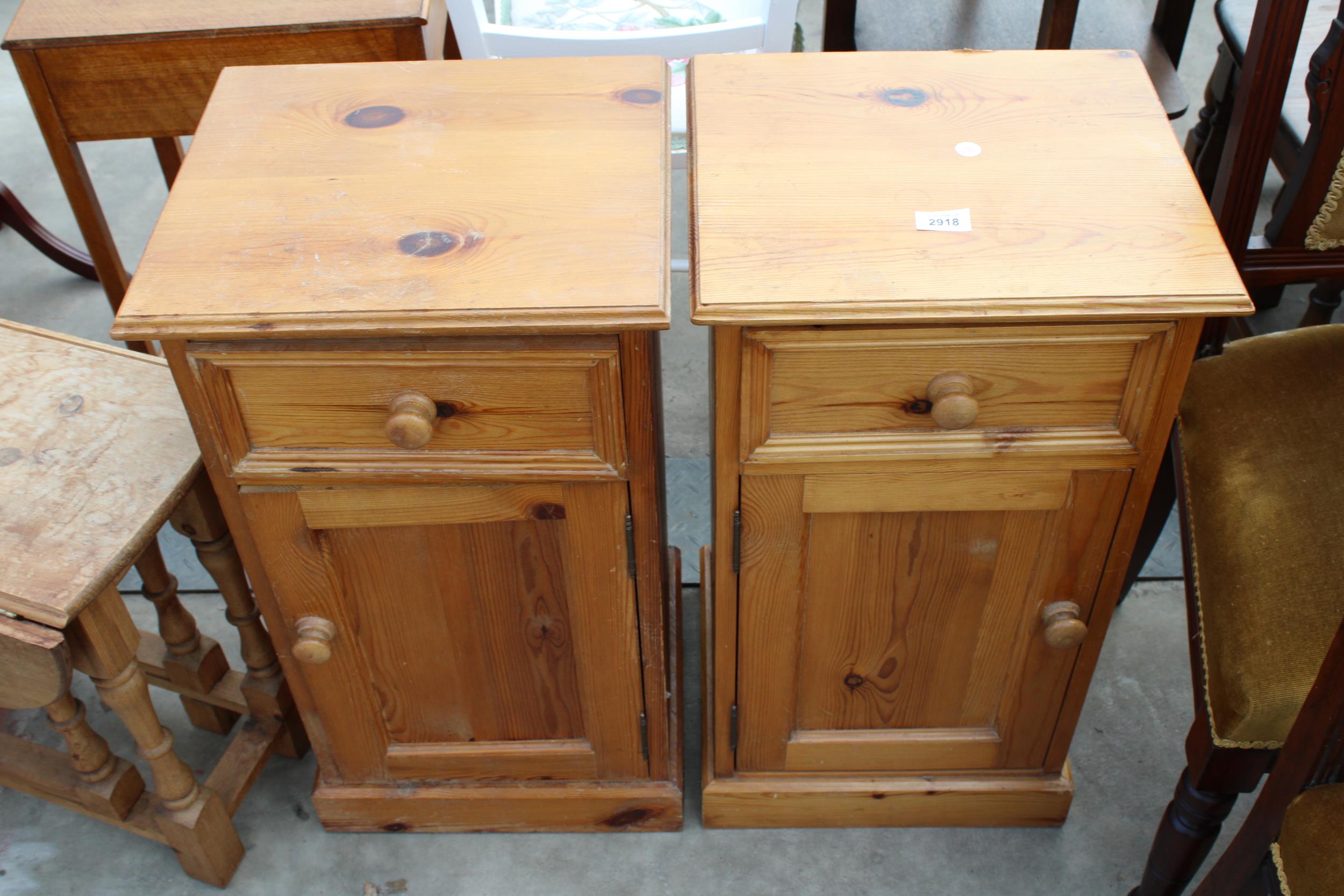 A PAIR OF PINE BEDSIDE LOCKERS