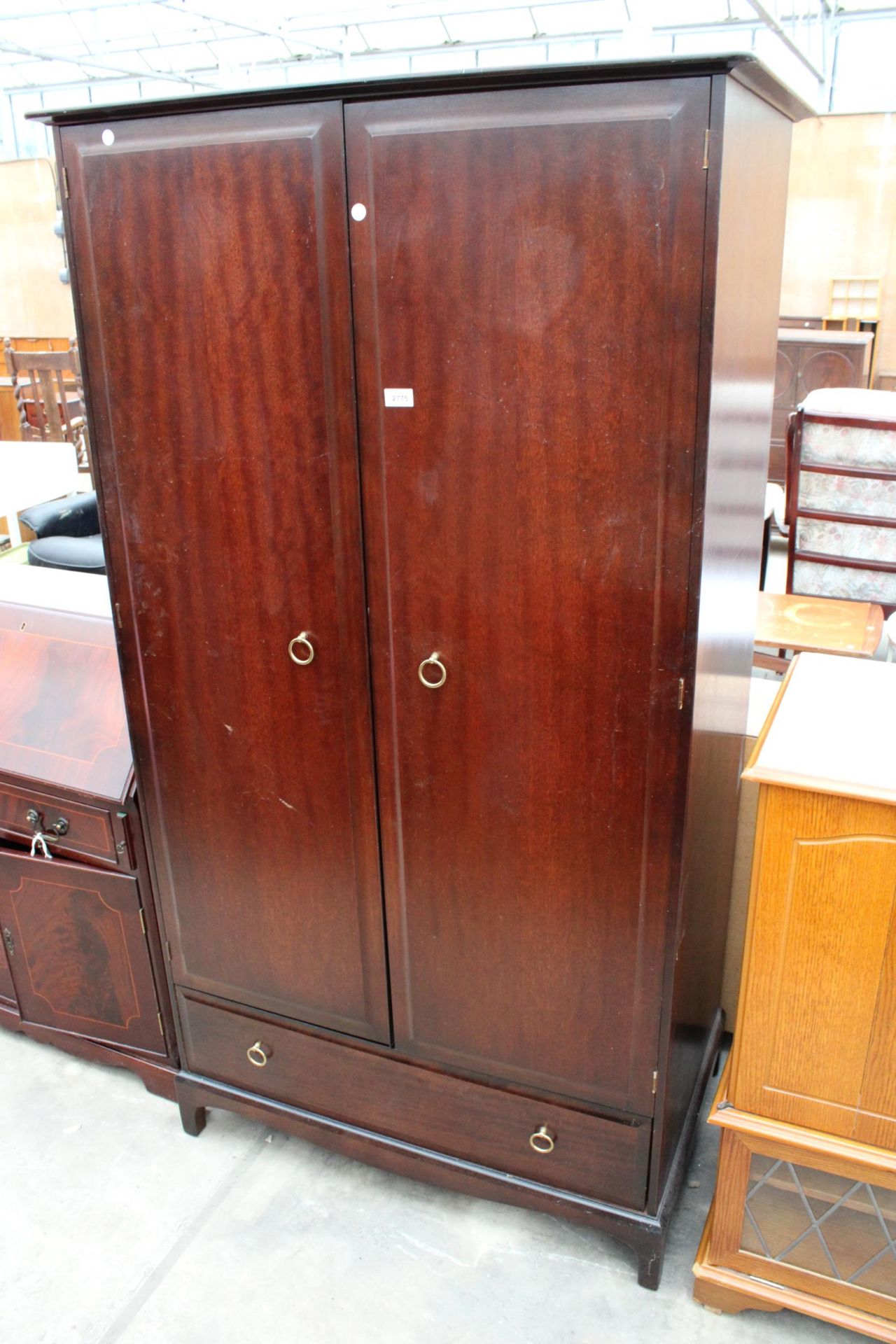 A STAG MINSTREL TWO DOOR WARDBROBE WITH DRAWER TO BASE 38" WIDE
