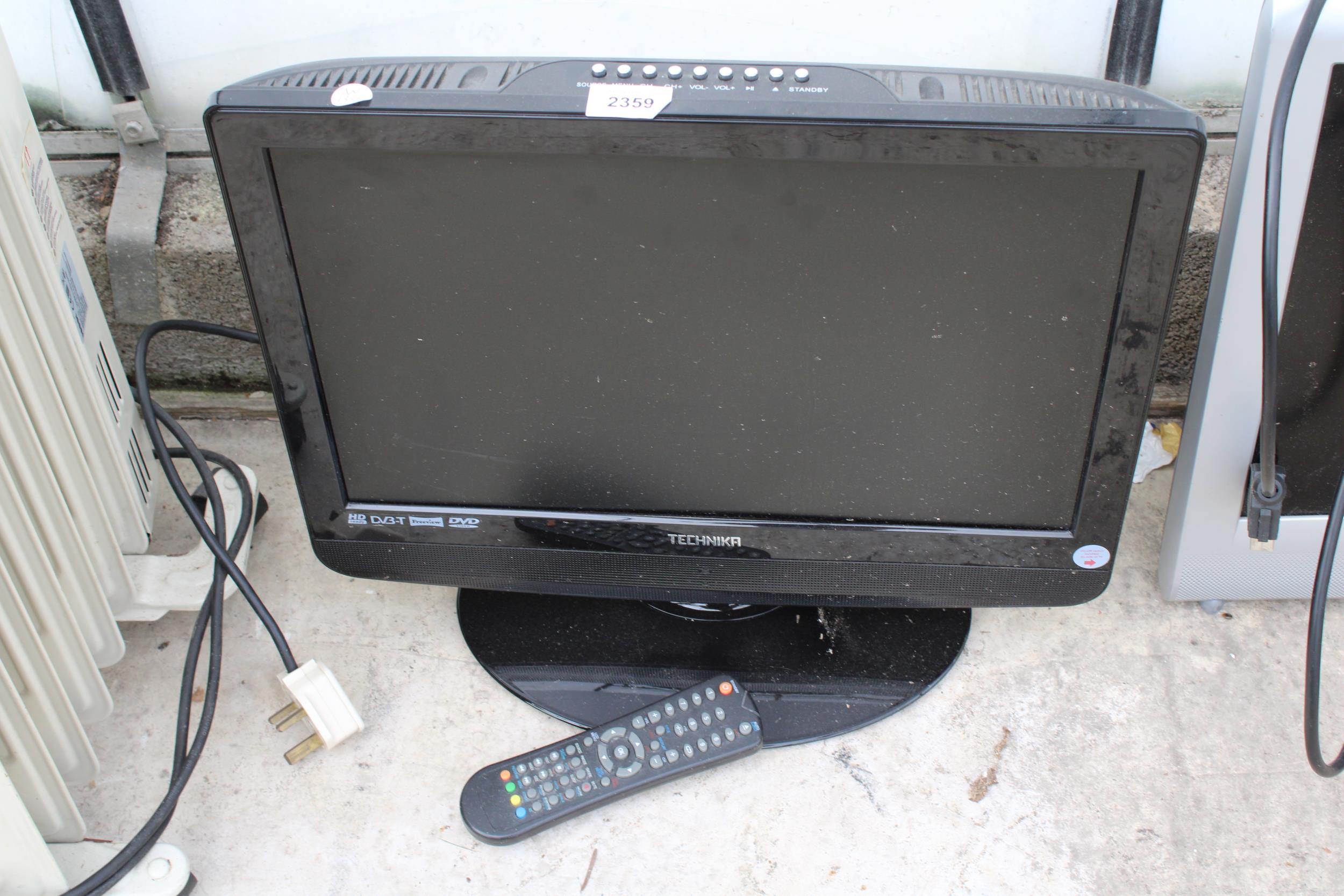 A 19" TECHNIKA TV/DVD COMPLETE WITH REMOTE