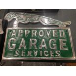 AN ALUMINIUM JAGUAR APPROVED GARAGE SERVICES SIGN
