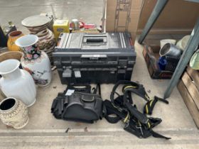A LARGE PLASTIC TOOL BOX, TOOL BAGS AND A HARNESS ETC
