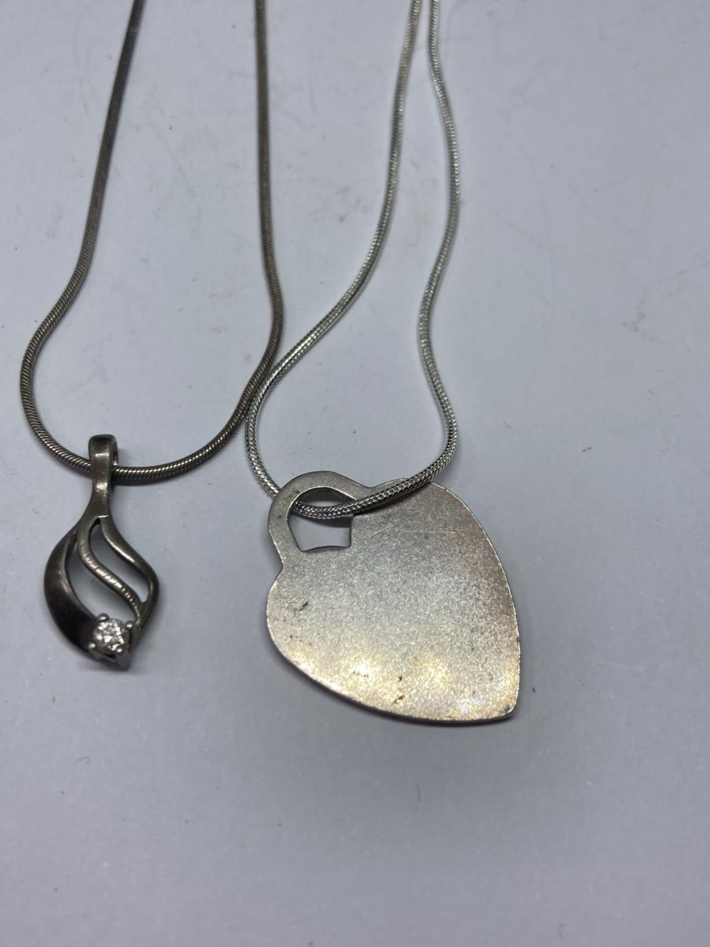 FOUR SILVER NECKLACES WITH PENDANTS - Image 3 of 3