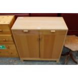 A HARDWOOD EFFECT CUPBOARD WITH BENTWOOD HANDLE 32" WIDE