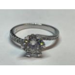 A MARKED 9K RING SET WITH A 1 CARAT OF MOISSANITE AS A SOLITAIRE AND CHIPS TO SHOULDERS SIZE I