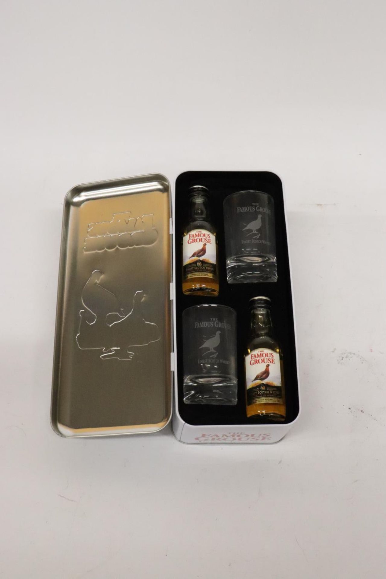 FOUR BOXES OF MINIATURE BOTTLES OF ALCOHOL TO INCLUDE FAMOUSE GROUSE WHISKEY, PORT AND TROPICAL - Image 2 of 7