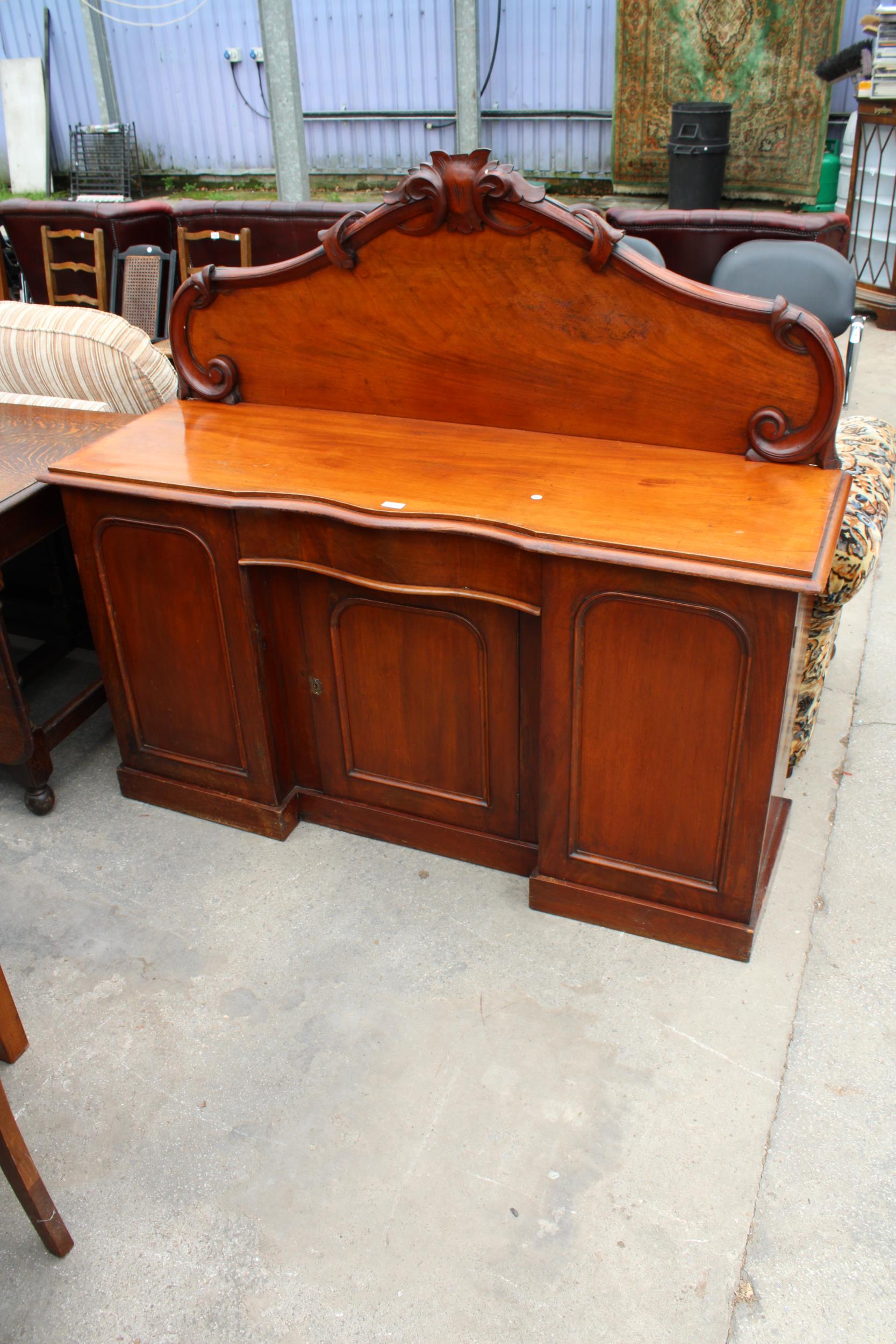 A VICTORIAN MAHOGANY THREE DOOR CHIFFONIER 60" WIDE