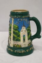 A LARGE TANKARD WITH EMBOSSED DECORATION, MADE IN THE UKRAINE, HEIGHT 28CM