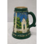 A LARGE TANKARD WITH EMBOSSED DECORATION, MADE IN THE UKRAINE, HEIGHT 28CM