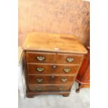 AN ANTIQUE STYLE WALNUT AND CROSS BANDED UNIT IN THE FORM OF A CHEST OF DRAWERS, 27" WIDE