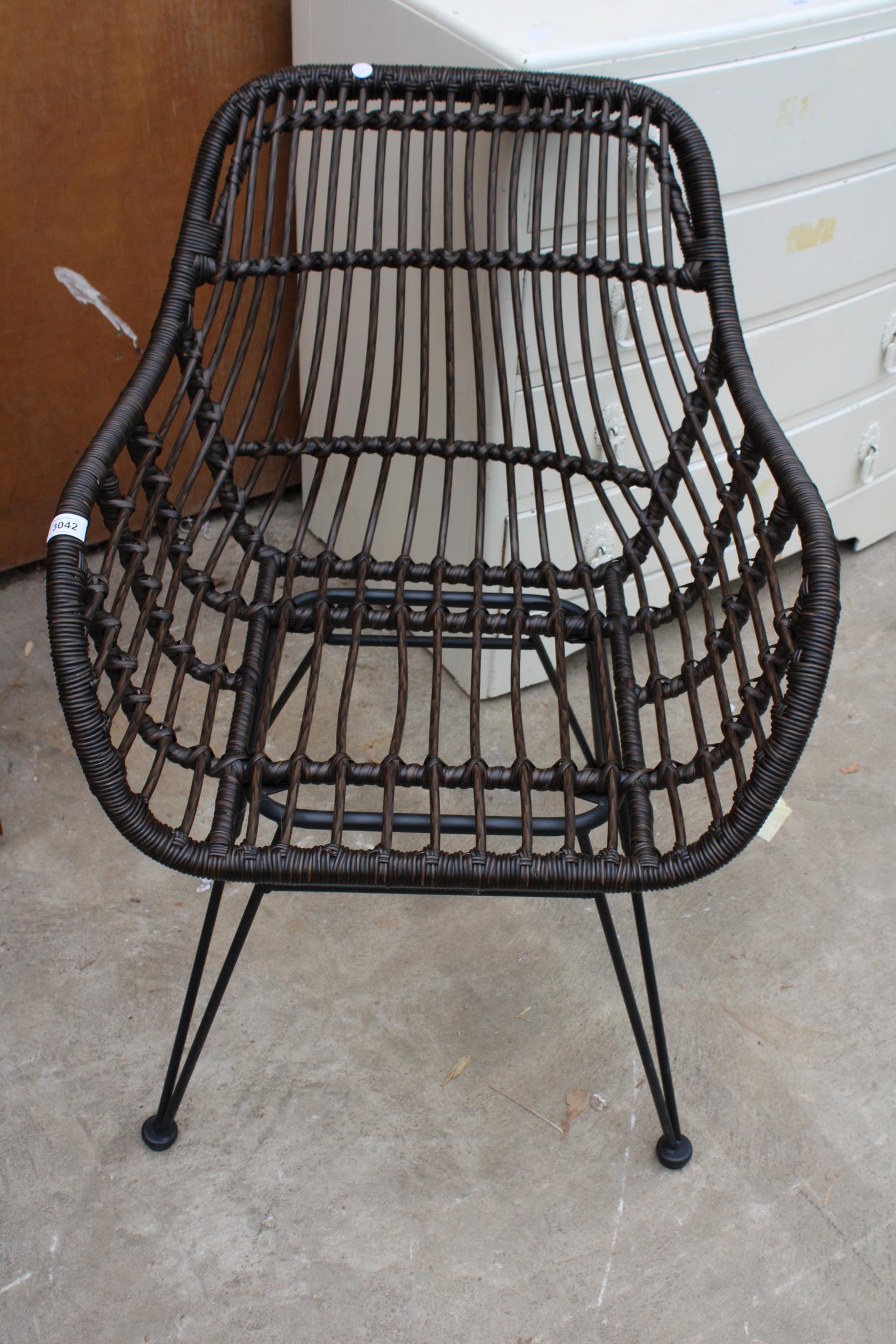 A WICKER AND BAMBOO ARMCHAIR