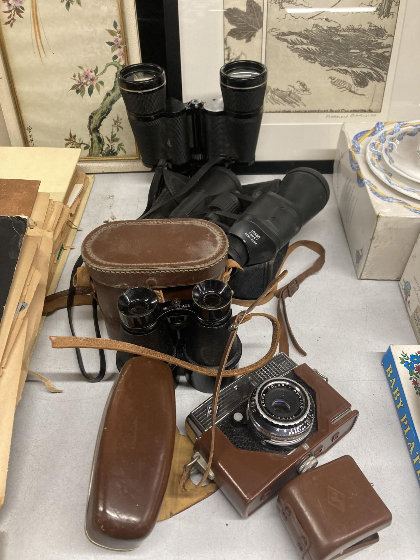 A THREE PAIRS OF BINOCULARS MADE IN BRITAIN AND HONG KONG PLUS A VINTAGE AGFA SILEETE CAMERA