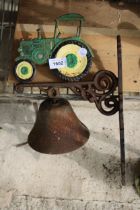 A CAST IRON JOHN DEERE TRACTOR BELL