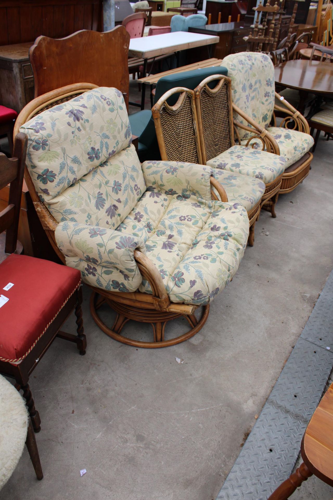 A WICKER AND BAMBOO SWIVEL CHAIR, EASY CHAIR AND A PAIR OF DINIGNG CHAIRS