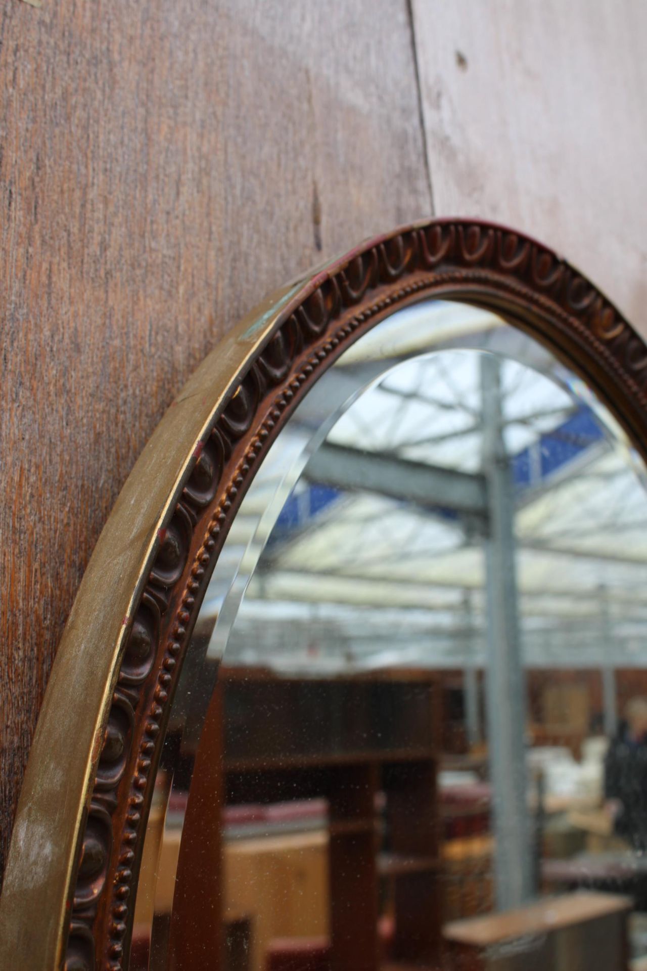 AN OVAL BEVEL EDGE WALL MIRROR 23" X 18" - Image 2 of 2