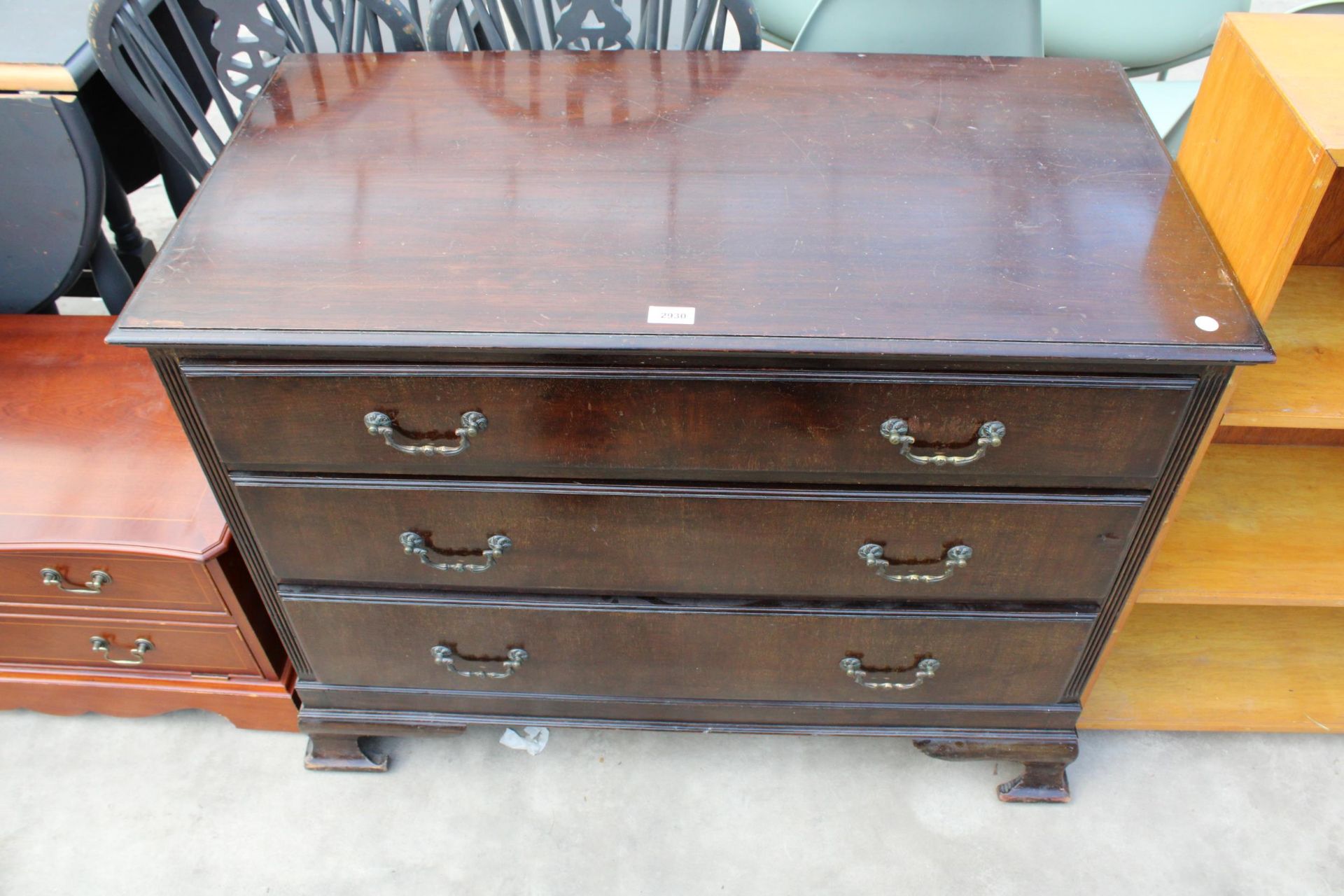 A MAHOGANY GEORGIAN STYLE CHEST OF THREE DRAWERS ON OGEE FEET 39" WIDE