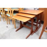 A RETRO TEAK NEST OF THREE TABLES