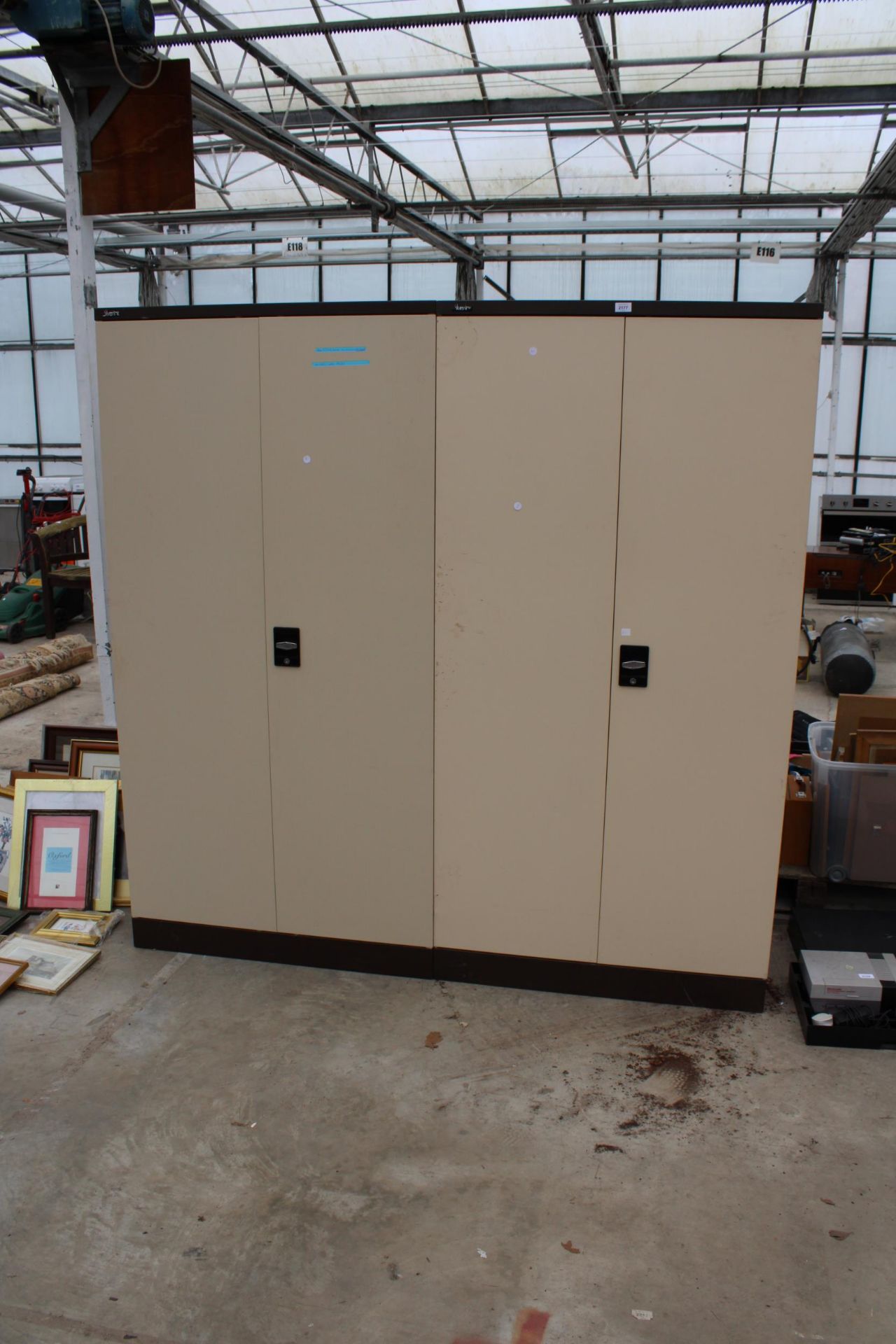 A PAIR OF METAL TWO DOOR WORKSHOP CUPBOARDS