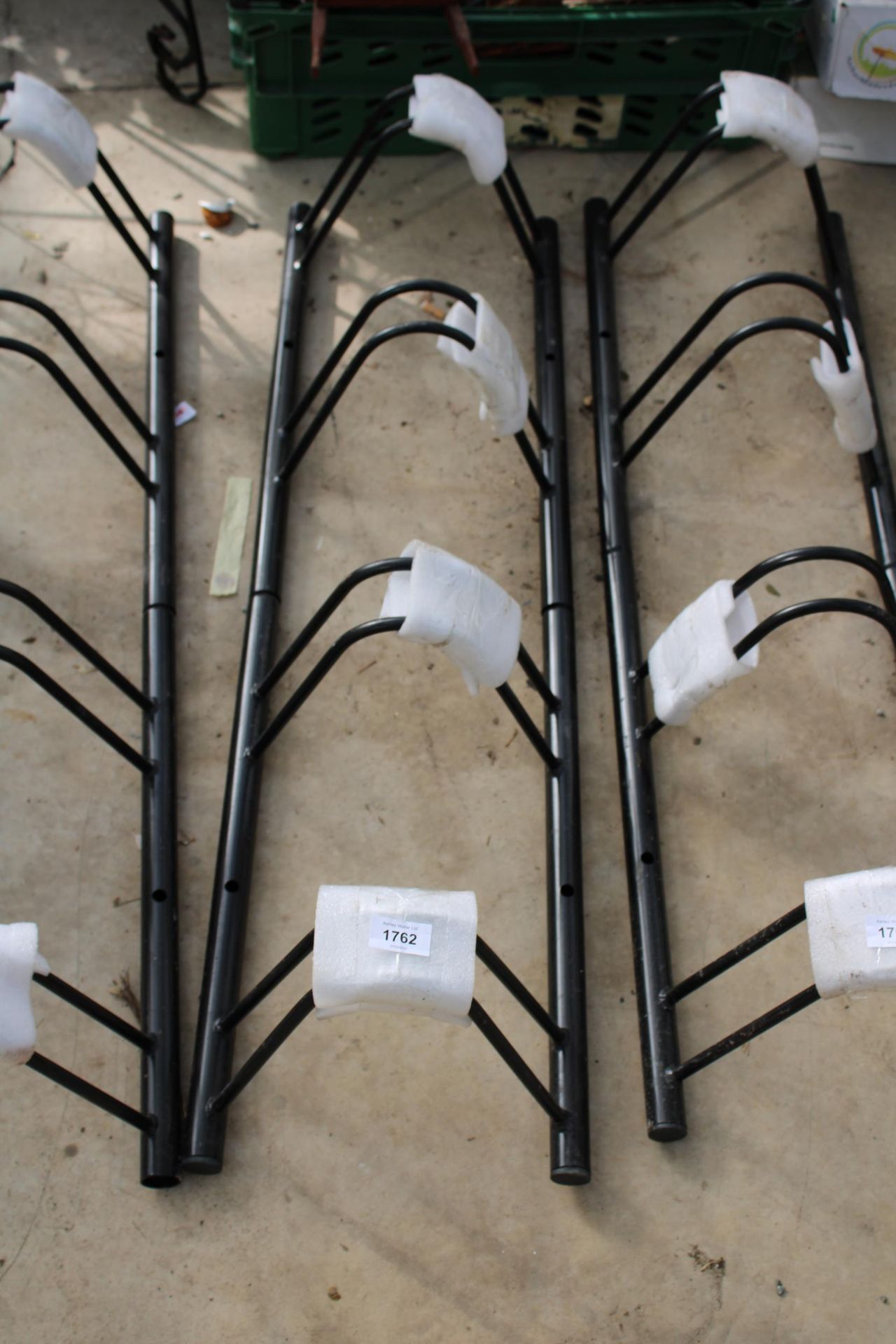 A FOUR SECTION METAL BIKE RACK