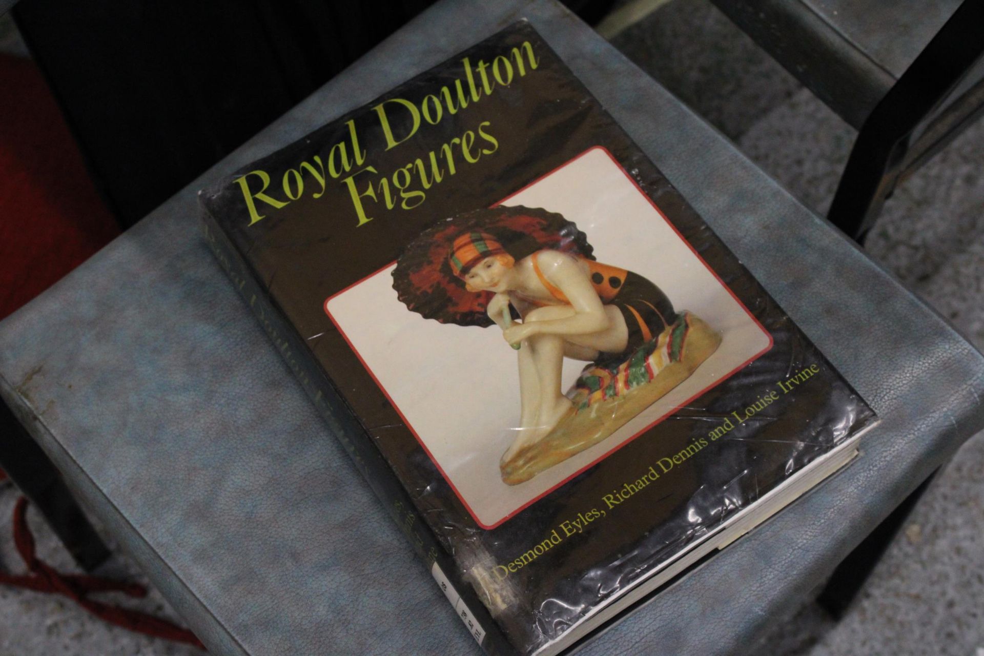 A VINTAGE ROYAL DOULTON FIGURES BOOK