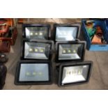 A SET OF SIX HEATHFIELD LED FLOOD LIGHTS BELIEVED IN WORKING ORDER BUT NO WARRANTY