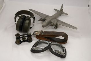 FIVE VINTAGE WAR ITEMS TO INCLUDE PILOT GOGGLES, HEADPHONES, PLANE, BELT AND BINOCULARS