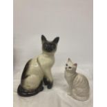 A LARGE BESWICK SIAMESE CAT TOGETHER WITH A WHITE BESWICK CAT 1030