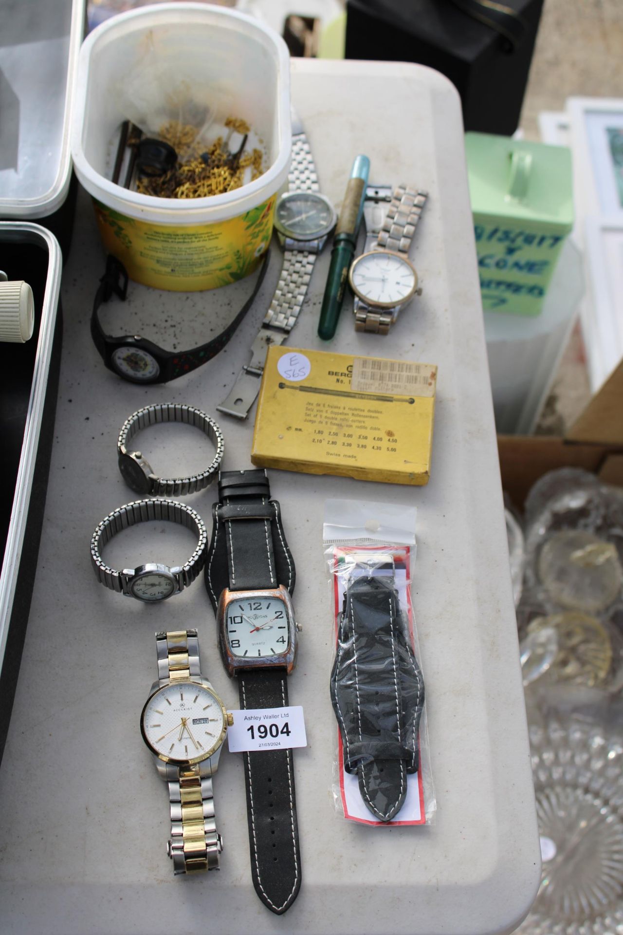 AN ASSORTMENT OF FASHION WATCHES AND TWO POCKET WATCH CHAINS ETC