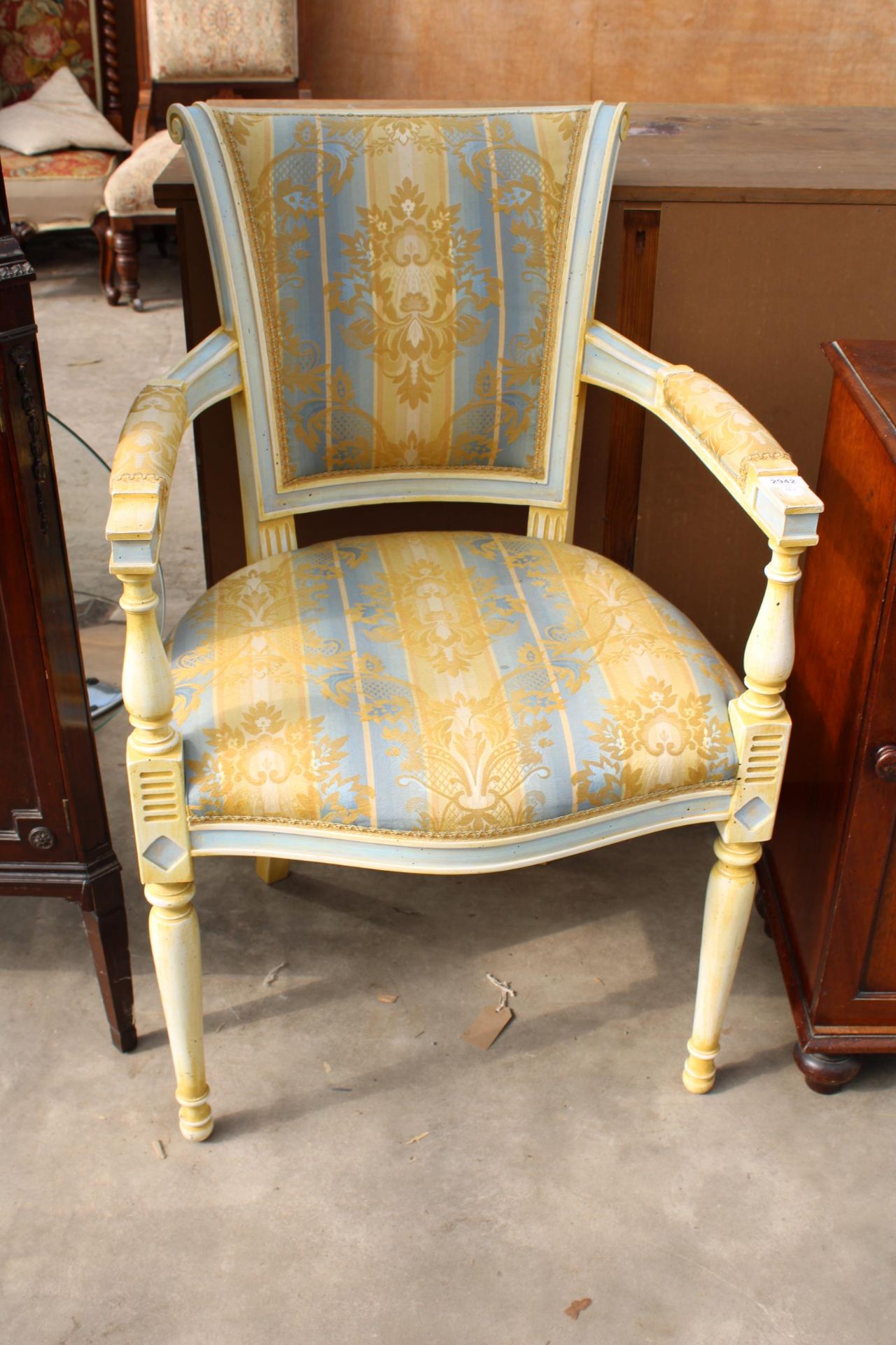 A CONTINETAL 19TH CENTURY STYLE OPEN ARMCHAIR WITH TURNED LEGS AND UPRIGHTS