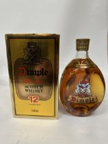 A BOXED 750ML 40% BOTTLE OF DIMPLE DE LUXE 12 YEARS OLD SCOTCH WHISKY