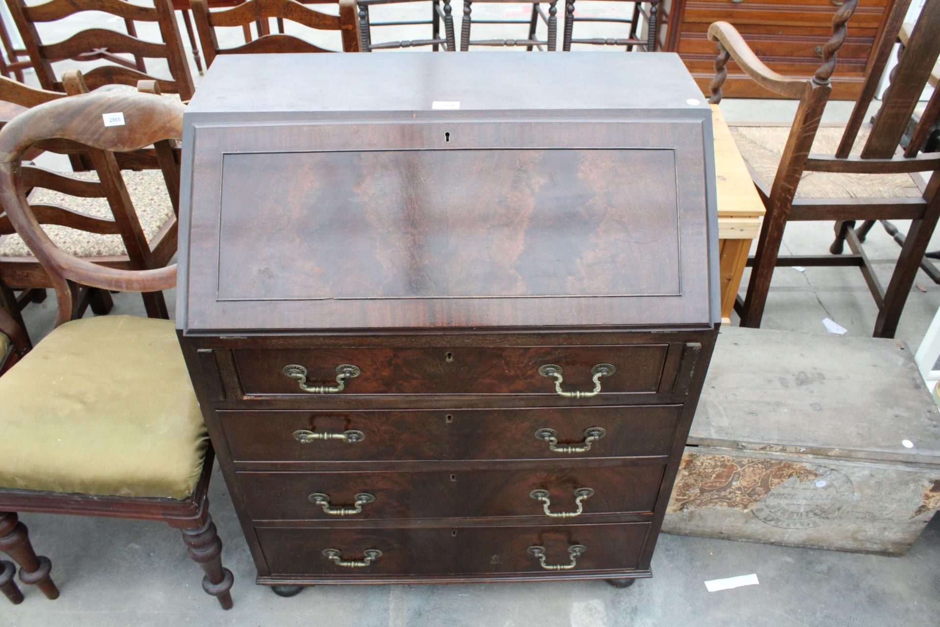 A REPRODUCTION MAHOGANY BUREAU WITH FITTED INTERIOR AND FOUR GRADUATED DRAWERS TO BASE 30" WIDE