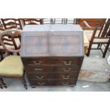 A REPRODUCTION MAHOGANY BUREAU WITH FITTED INTERIOR AND FOUR GRADUATED DRAWERS TO BASE 30" WIDE