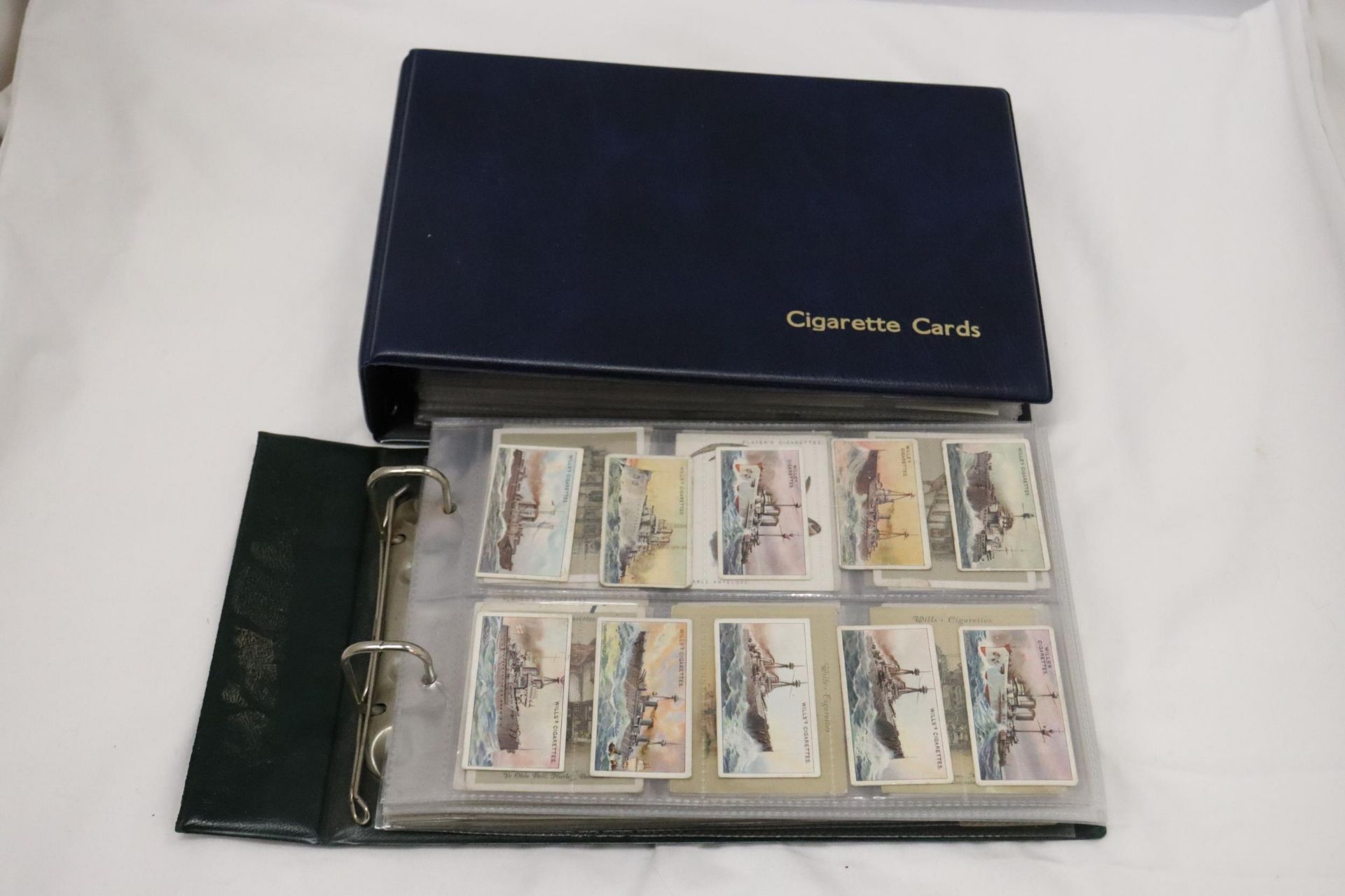 TWO 1930 CIGARETTE CARD ALBUMS AND CARDS TO INCLUDE SHIPPING, KINGS OF SPEED, ANIMALS, ETC