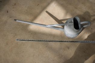 A VINTAGE GALVANISED LONG SPOUTED HAWES WATERING CAN