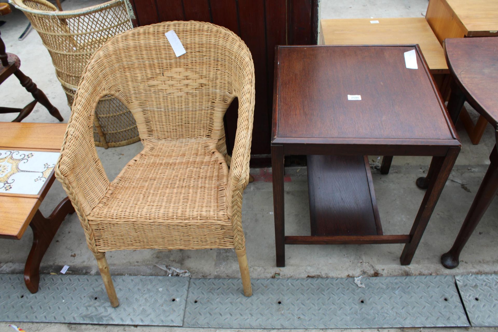 A WICKER CONSERVATORY CHAIR AND OAK TWO TIER OCCASIONAL TABLE