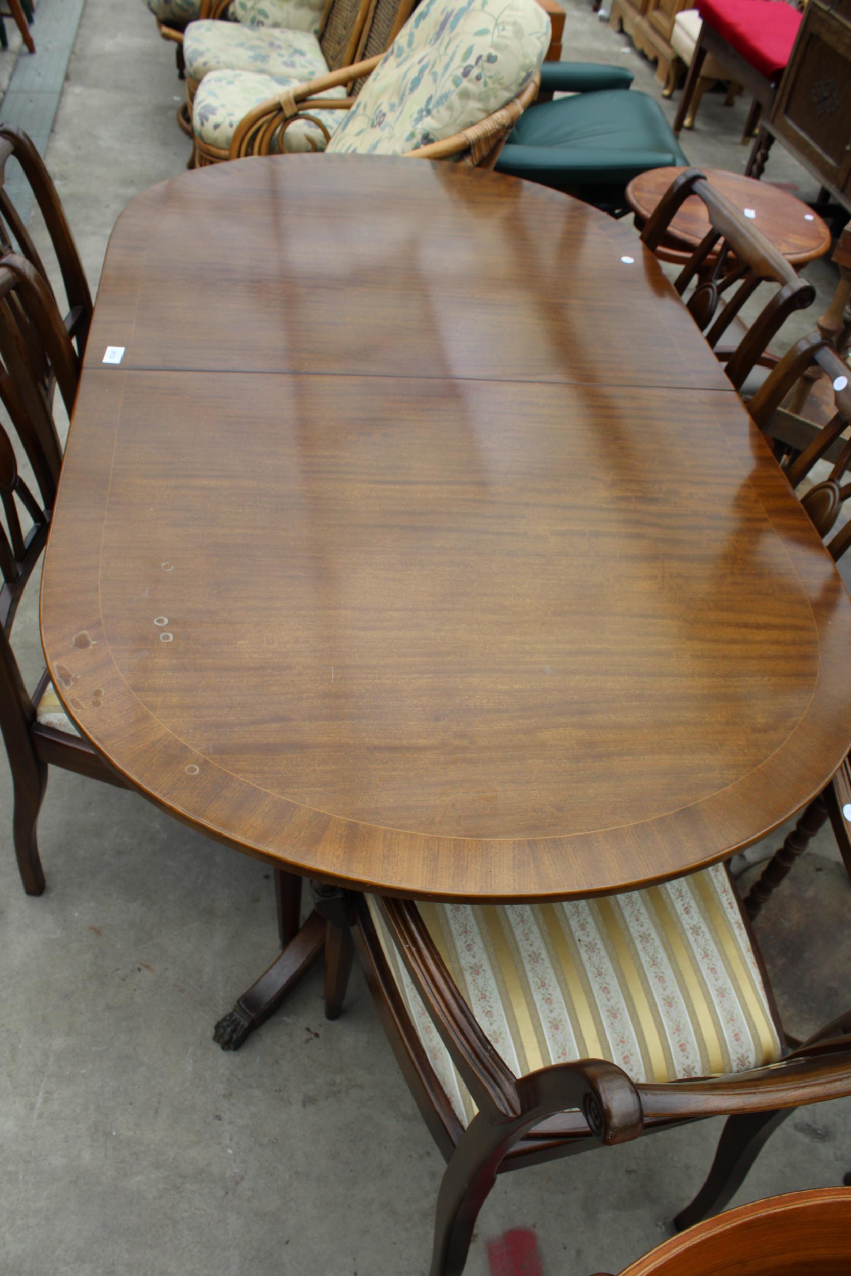 A REGENCY STYLE TWIN PEDESTAL DINING TABLE AND FIVE CHAIRS ONE BEING A CARVER - Image 3 of 3