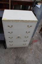 A CREAM AND GILT CHEST OF FIVE DRAWERS 24" WIDE
