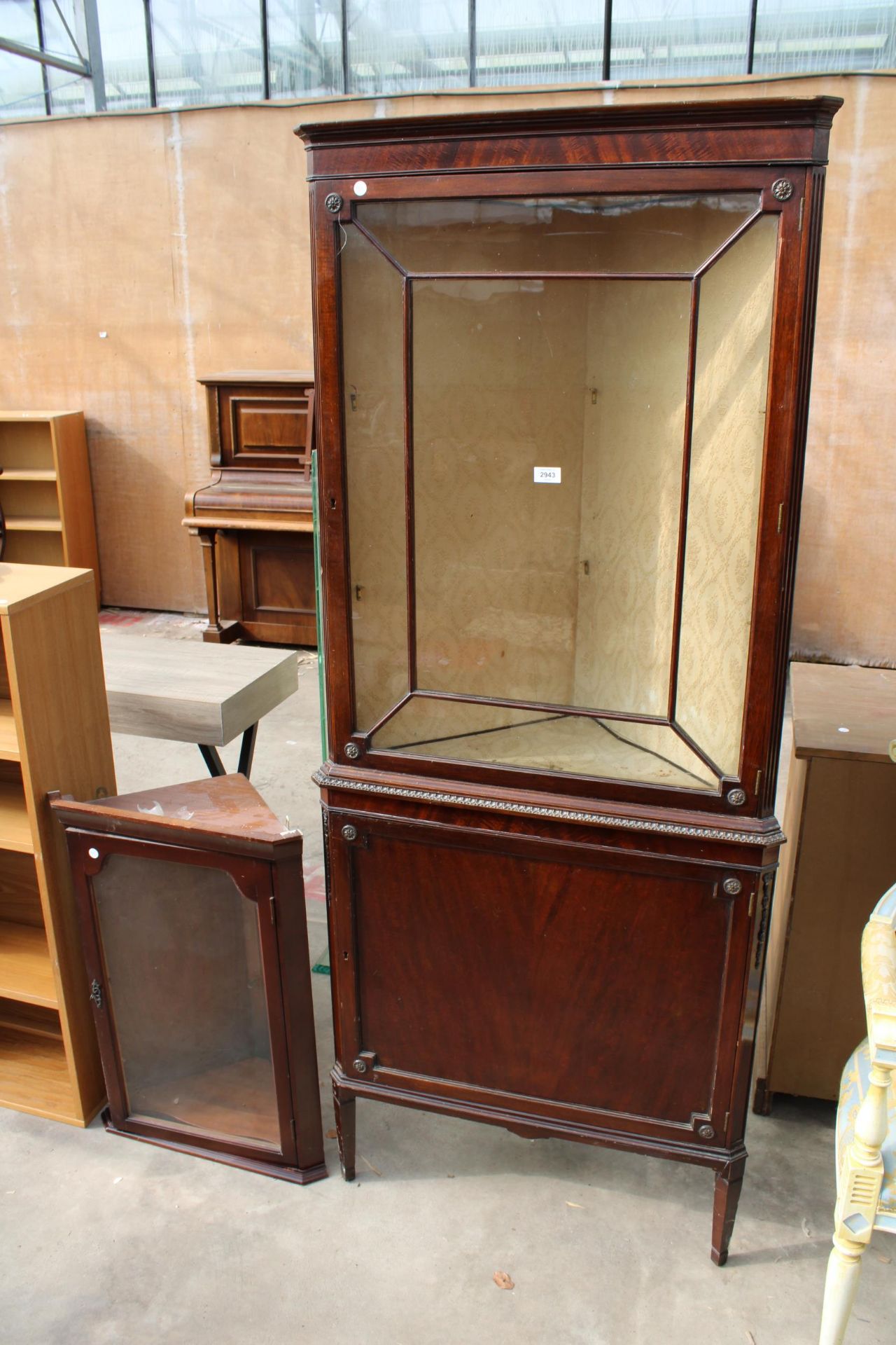 A 19TH CENTURY STYLE MAHOGANY CORNER CUPBOARD WITH GLAZED UPPER PORTION AND A SMALL CORNER CUPBOARD
