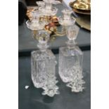 A CRYSTAL AND AND BRASS COLOURED CANDLEARBRA TOGETHER WITH TWO CRYSTAL DECANTERS AND CHRISTMAS