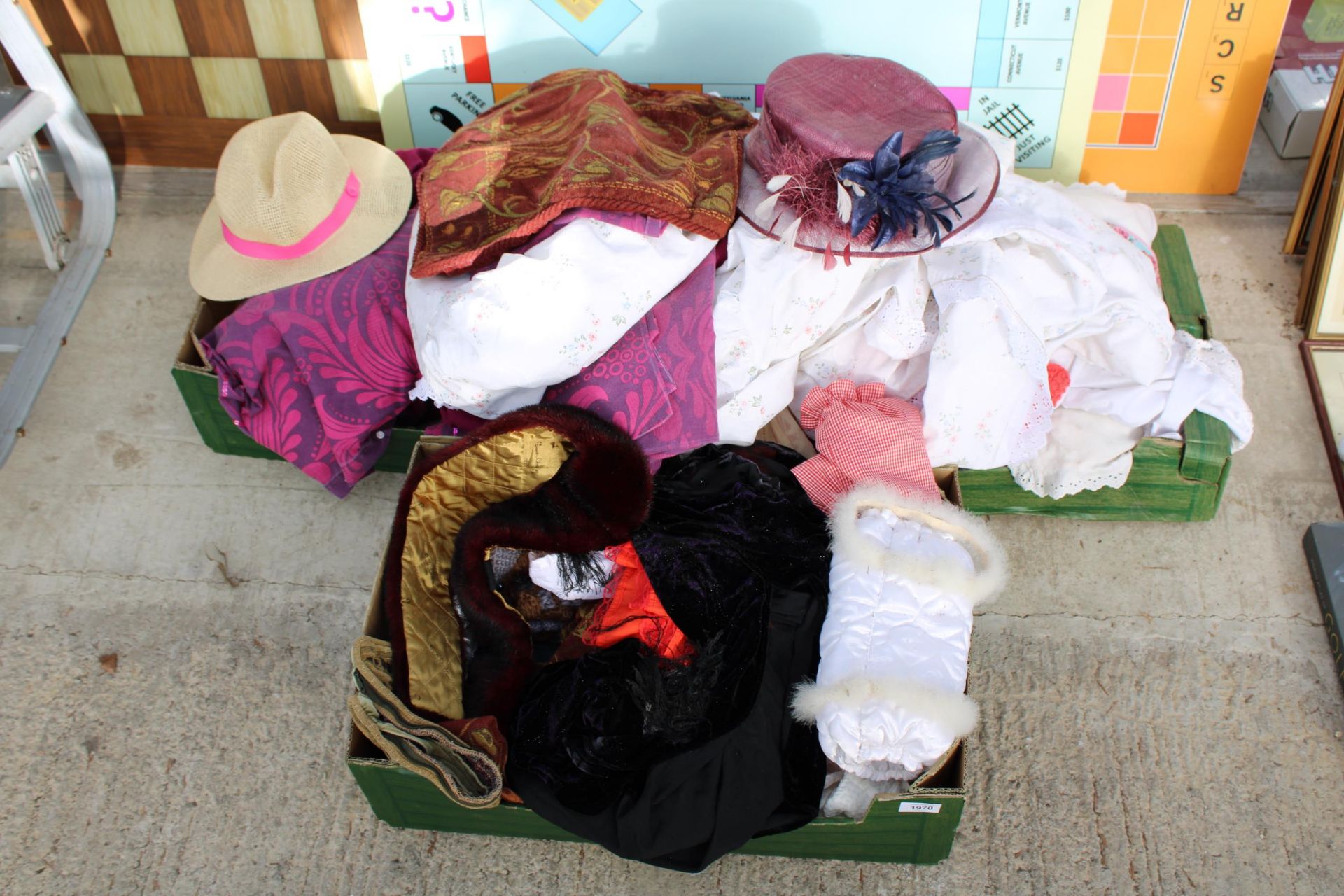 AN ASSORTMENT OF LADIES HATS AND CLOTHING