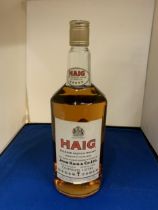 A 1 LITRE BOTTLE OF HAIG BLENDED SCOTCH WHISKY