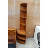 A RETRO TEAK CORNER CABINET