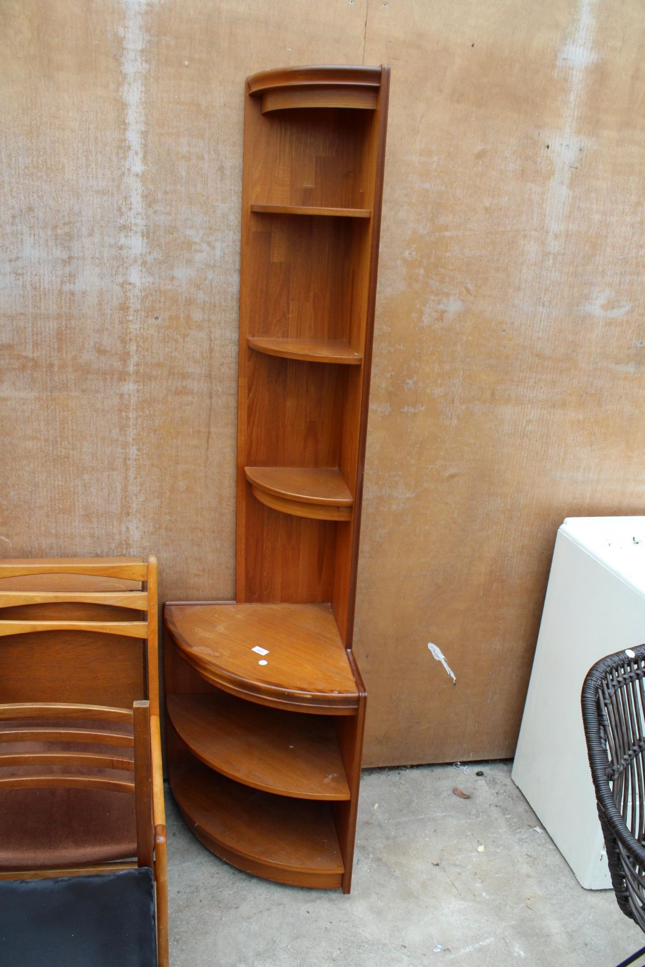 A RETRO TEAK CORNER CABINET