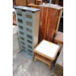 A TWO TIER WICKER LAMP TABLE WITH TILED TOP AND A GLASS FRONTED TWO DOOR BOOKCASE