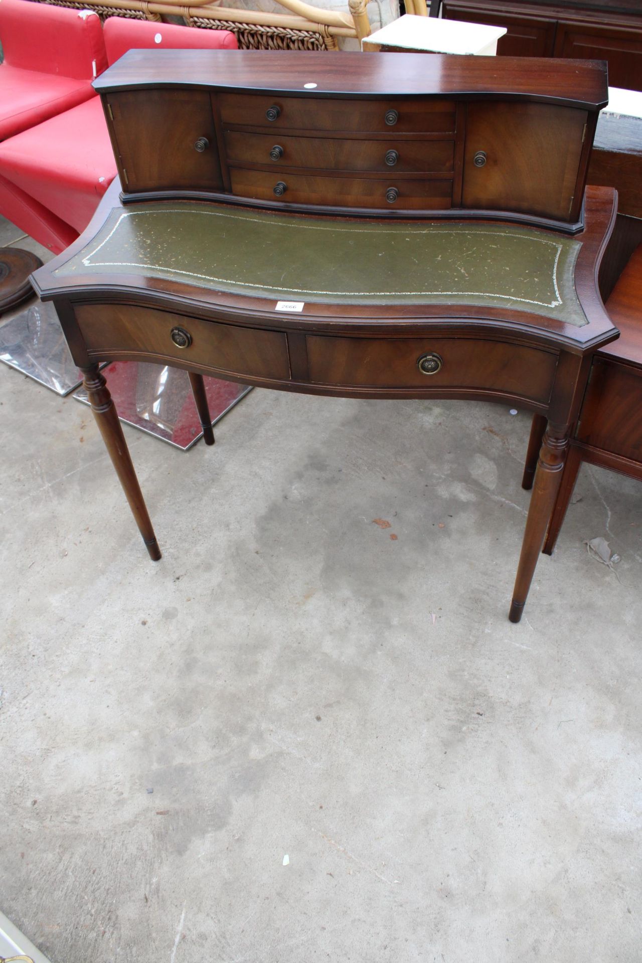 A REPRODUCTION MAHOGANY LADIES WRITING TABLE 36" WIDE WITH INSET LEATHER TOP