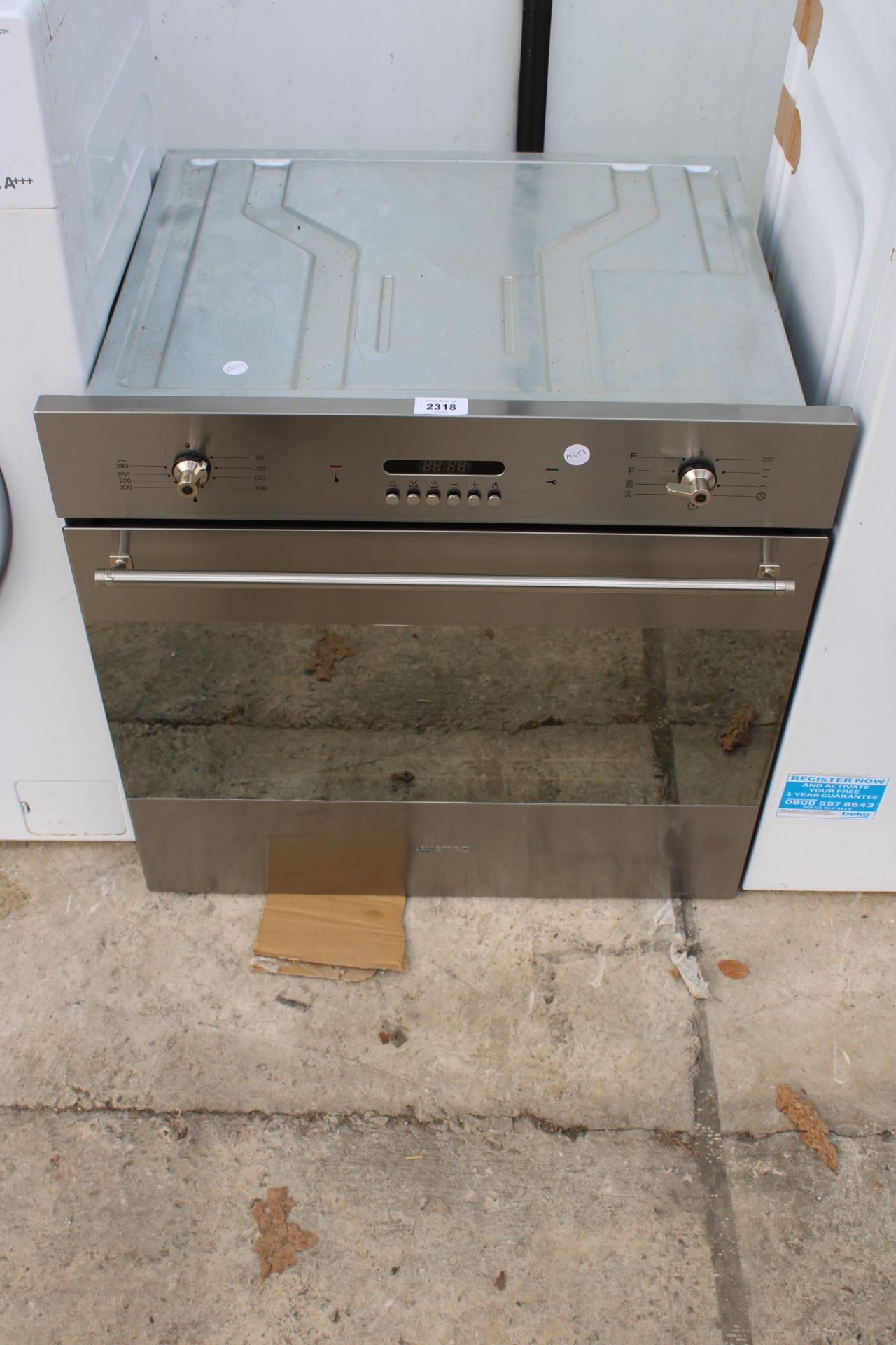 A SILVER SMEG INTERGRATED OVEN